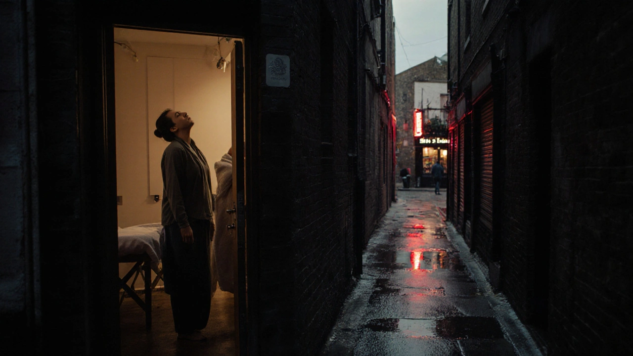 A person exiting a hidden massage studio in East London, wrapped in a towel, face calm and peaceful, dim alleyway light behind them.
