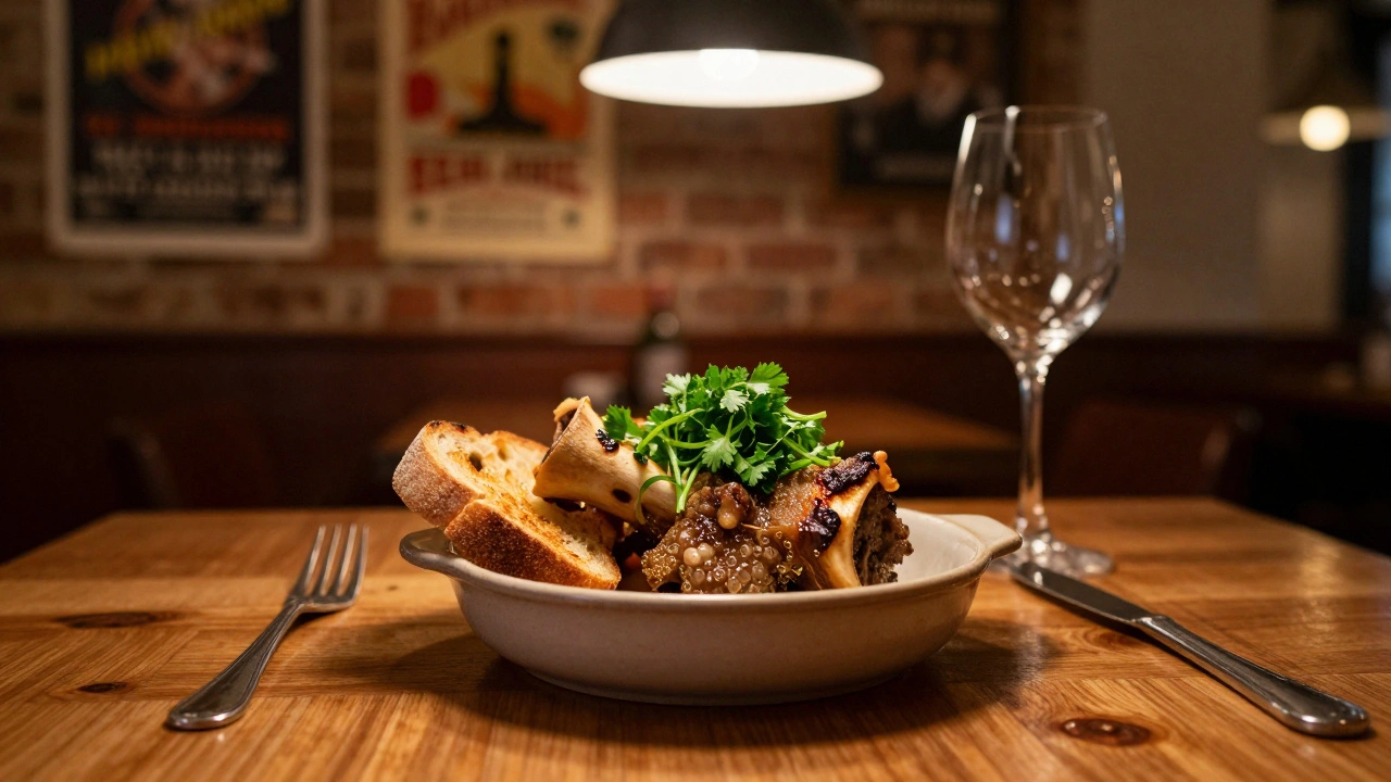 Roasted bone marrow in a ceramic dish with toasted bread and parsley salad at St. John restaurant.