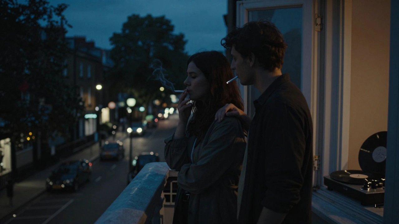 Two figures stand silently on a balcony at night, sharing a cigarette under soft city lights, their shoulders touching.
