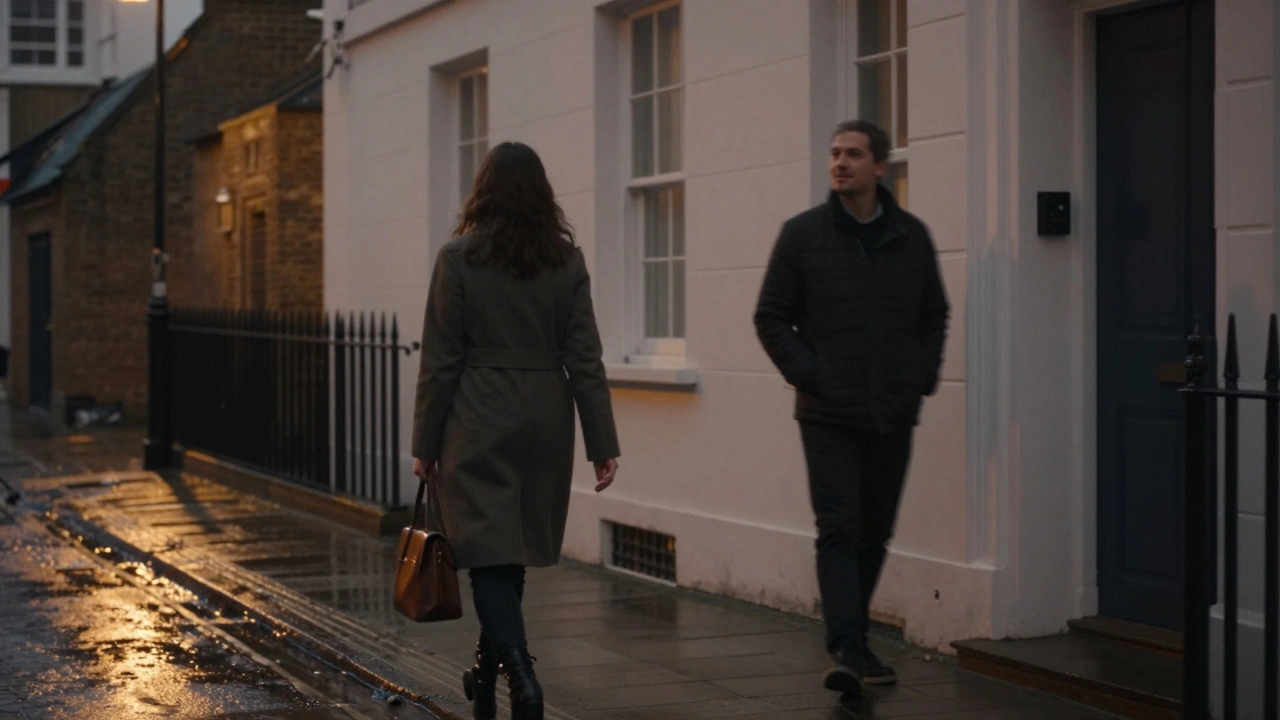 A professional escort walking away from a private residence in Shoreditch at dusk, client exiting behind her.